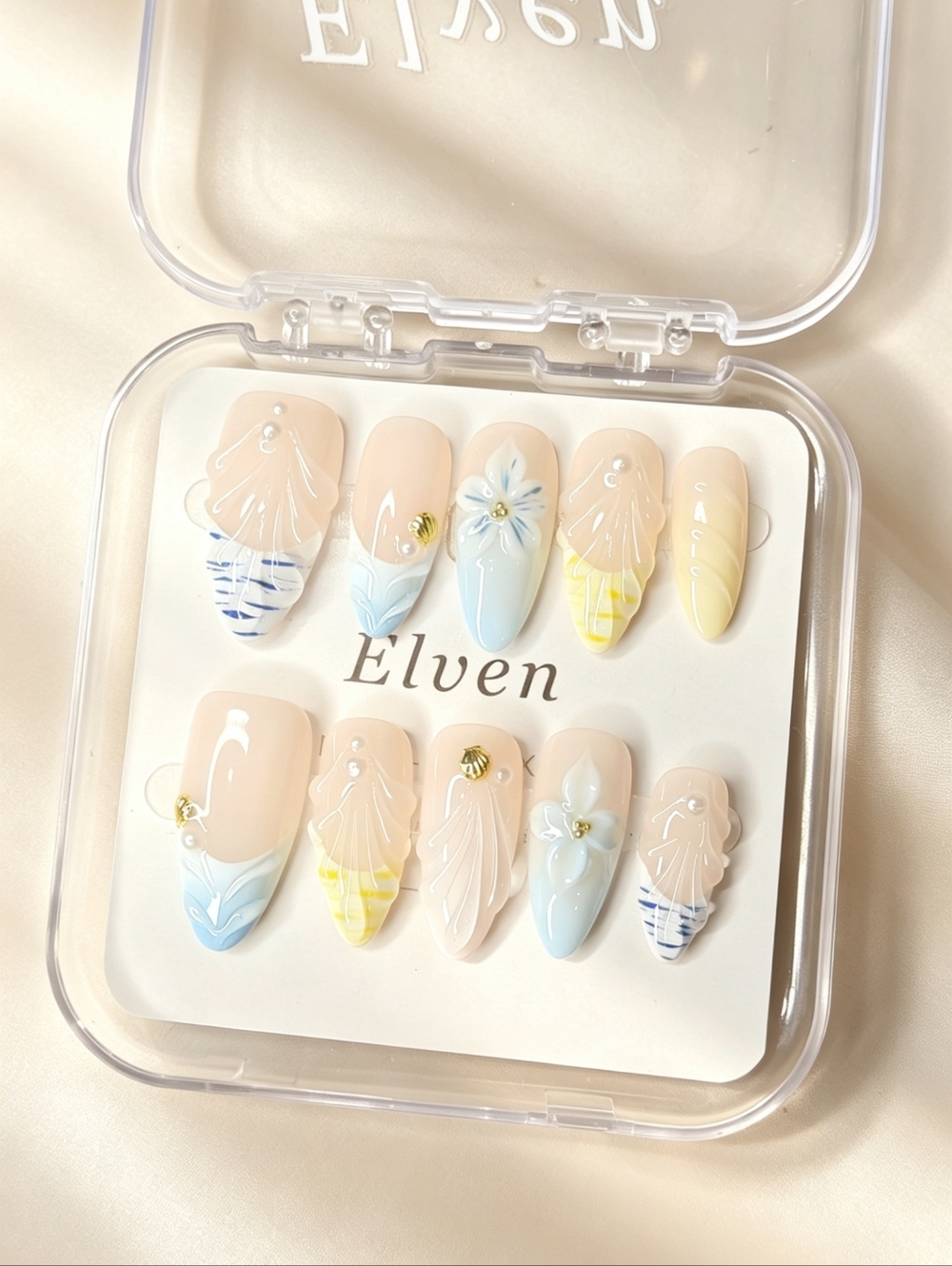 Handmade Press On Nails Art Set with Blue and Yellow Accents Almond Shape